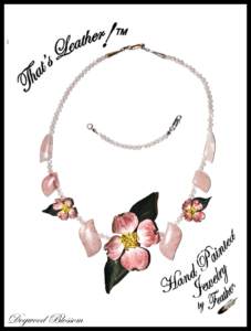 Pink Dogwood Necklace Leather Pink Dogwood Necklace with Rose quartz fan and round beads. Included is a necklace extender.